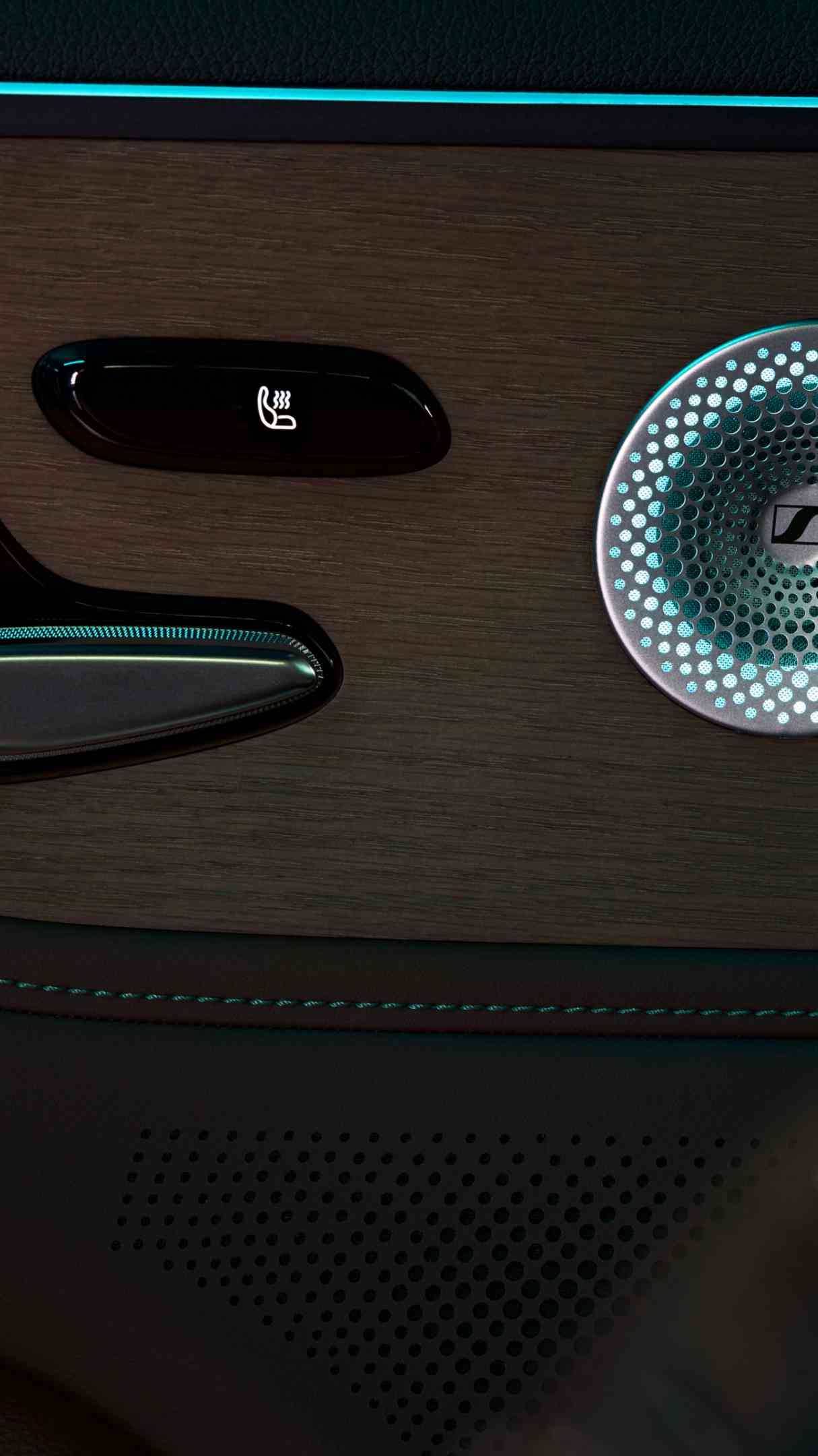 Close-up of the smart #5 door panel with seat adjustment buttons and a speaker.